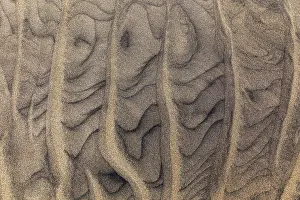 Full Frame Coastal Photography Impressions: Wave pattern, structures in the sand on the sandy beach