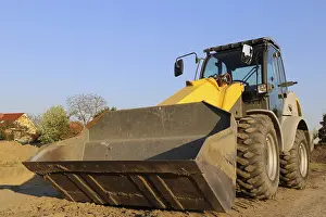 Construction Site Germany Impressions: Wheel loader at sunset, here in the RingstraBe development area (Mutterstadt)