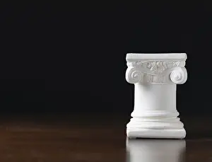 Dark Background Architecture Impressions: White ionic design column on dark background