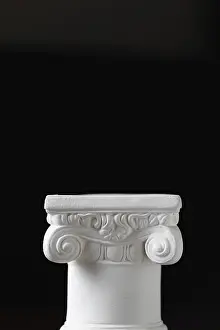 Dark Background Architecture Impressions: White ionic design column on dark background