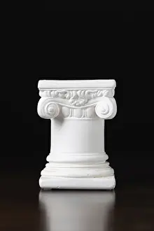 Dark Background Architecture Impressions: White ionic design column on dark background