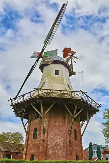 Uninhabited Windmill Structure Impressions: A Windmill under the Cloudy Sky