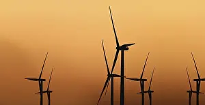 Windmill Silhouette Impressions: Windmill at sunset against light