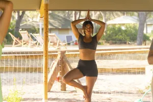 Yoga Instructor Impressions: Yoga instructor practicing the tree pose