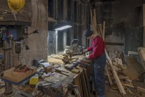 Young Man In Workshop Impressions: Young man at a Flex in his workshop