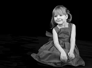 Studio Portrait Photography Impressions: Young model posing on black background